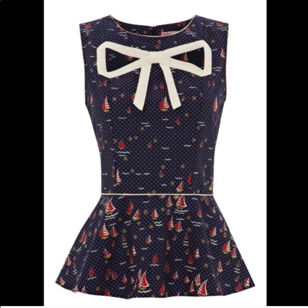Trolled Dolly Peplum top with cutout